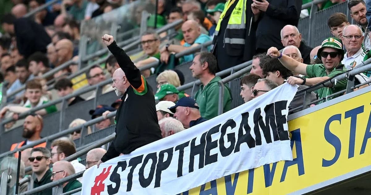 Fans holding a banner at a sports event Fans holding a banner at a sports event