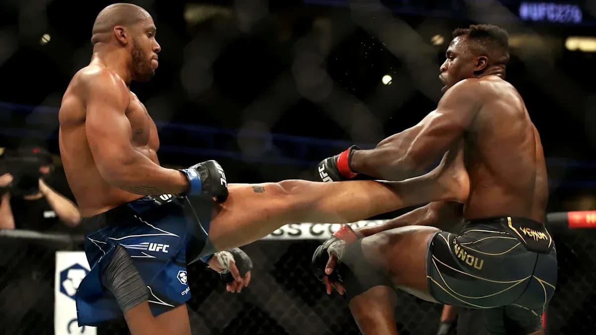 Two fighters exchanging strikes in UFC match Two fighters exchanging strikes in UFC match
