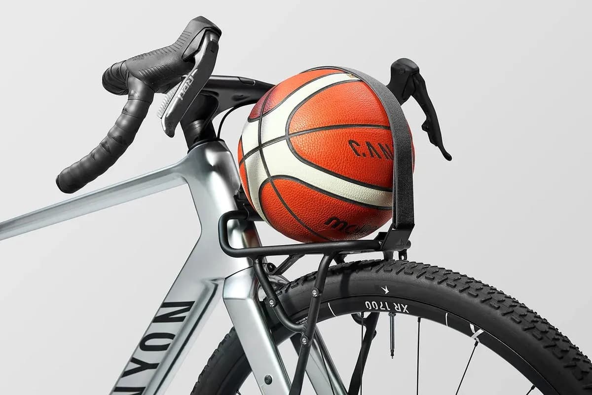 Basketball secured on bicycle's rear rack Basketball secured on bicycle's rear rack