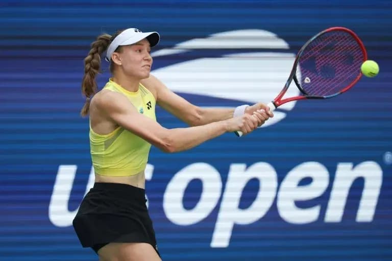 Player hitting a forehand during US Open match Player hitting a forehand during US Open match