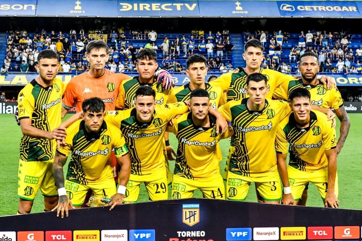 Football team posing for photo before match Football team posing for photo before match