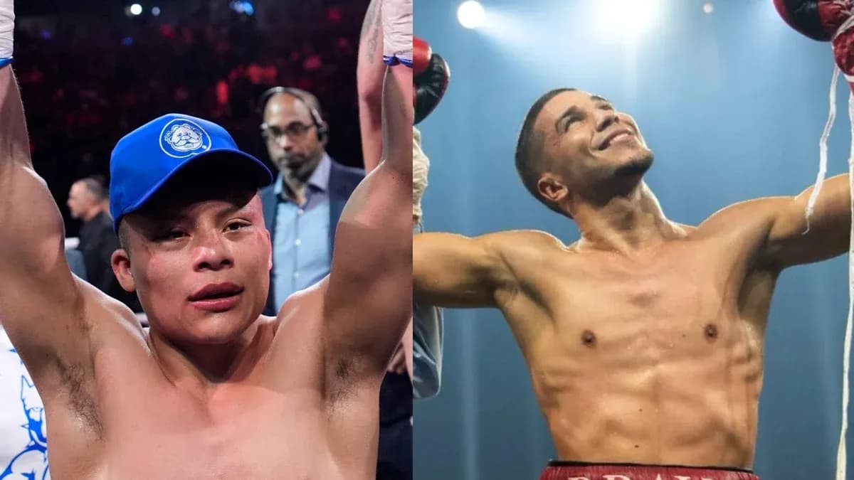 Two boxers celebrating victory in the ring Two boxers celebrating victory in the ring