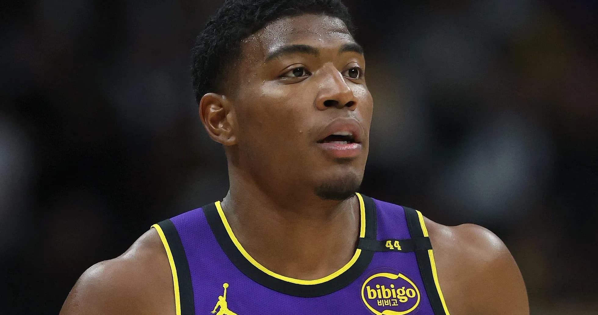 Player in Lakers jersey during game action Player in Lakers jersey during game action