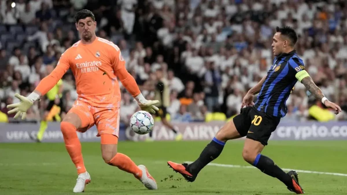 Goalkeeper attempting to block shot during match Goalkeeper attempting to block shot during match