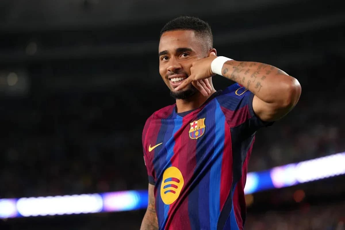 Player celebrating a goal with phone gesture Player celebrating a goal with phone gesture