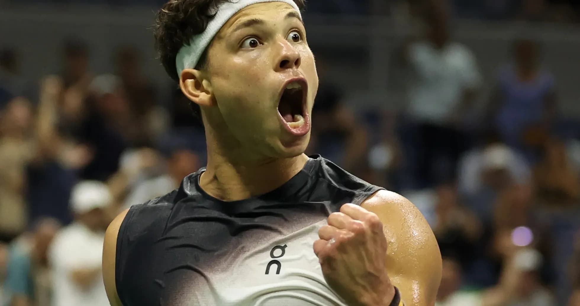 Tennis player celebrating during a match Tennis player celebrating during a match