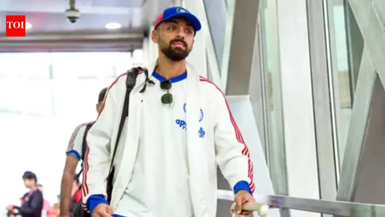 Player walking through airport terminal with luggage Player walking through airport terminal with luggage